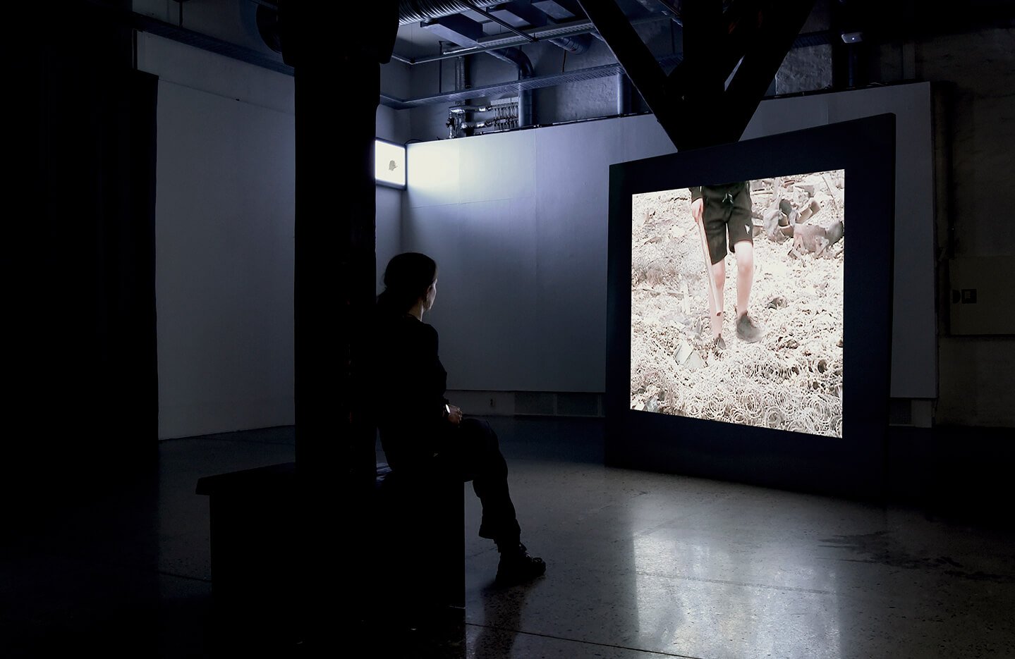 Digital projection installation with designed furniture in Anna Clawson's Echo_Locations