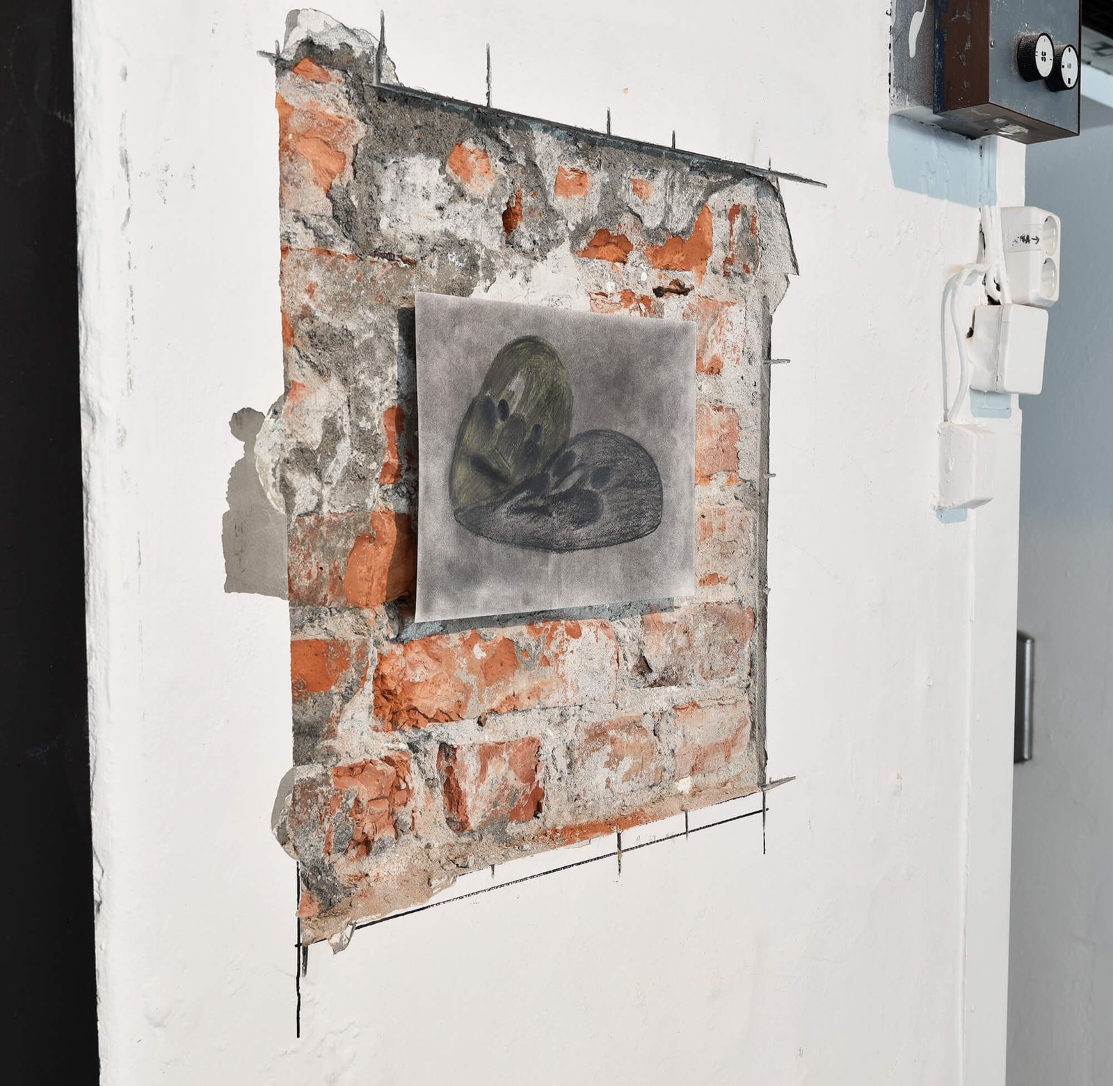 Graphite drawing on brick wall by Anna Clawson